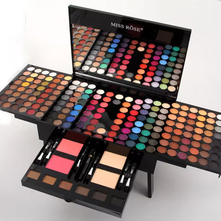 Makeup palette set with various colors and brushes on a white background, featuring the brand 'Miss Rose'.