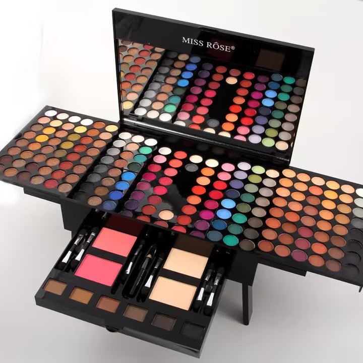 Makeup palette set with various colors and brushes on a white background, featuring the brand 'Miss Rose'.