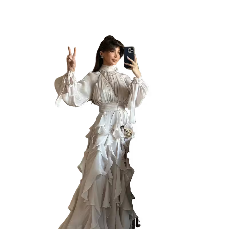 Woman in a white vintage dress taking a mirror selfie on a transparent background