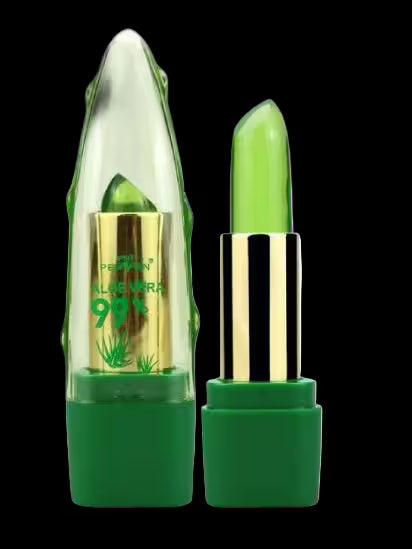 Green lipstick with gold cap on a black background