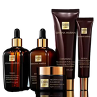 Senana Marina skincare products including bottles and tubes on a black background