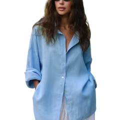 Woman wearing a light blue shirt and sunglasses on a transparent background
