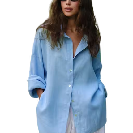 Woman wearing a light blue shirt and sunglasses on a transparent background