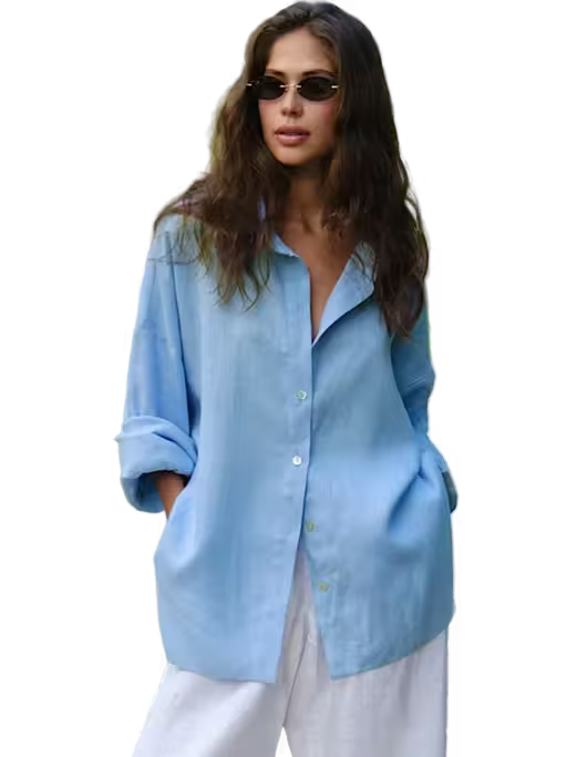 Woman wearing a light blue shirt and sunglasses on a transparent background