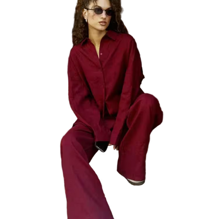 Person wearing a red outfit with white sneakers on a transparent background