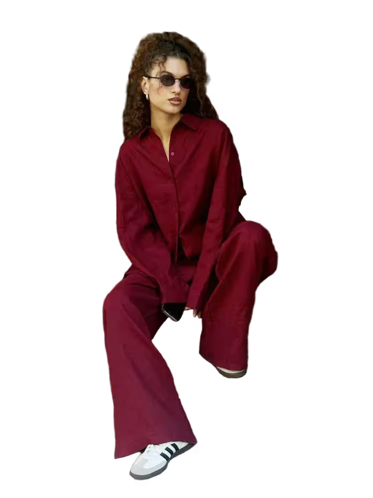 Person wearing a red outfit with white sneakers on a transparent background
