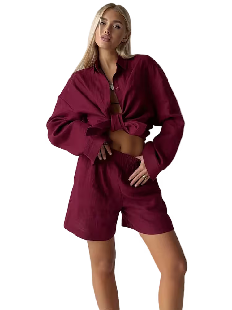 Woman wearing a burgundy outfit with a matching shirt and shorts on a transparent background