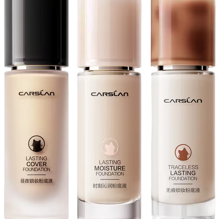 Three bottles of Carslan foundation with different shades on a white background
