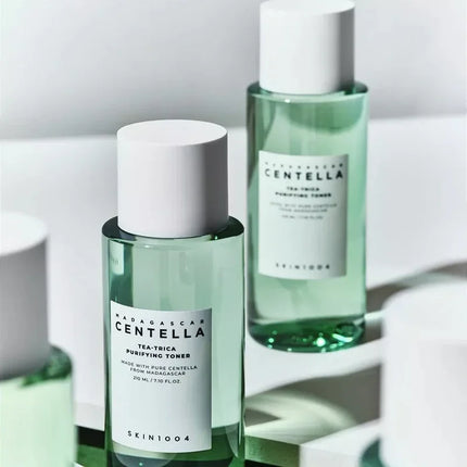 Two bottles of Skin1004 Madagascan Centella Tea-Trica toner on a white surface.