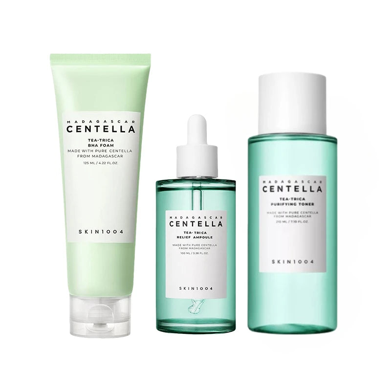 Set of skincare products from Skin1004 with green and white packaging on a white background
