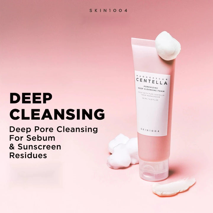 SKIN1004 cleansing foam with cotton pads on a pink background