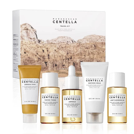 Skincare travel kit with bottles and packaging featuring 'Madagascar Centella' on a white background.