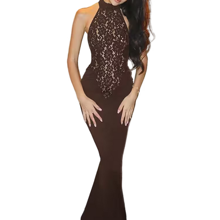 Woman wearing a black lace evening gown on a white background