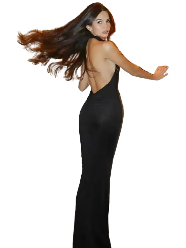 Woman in a black dress with flowing hair on a transparent background