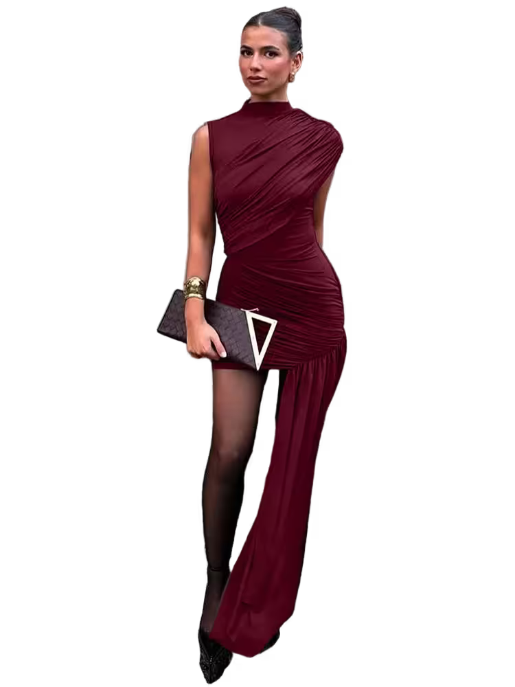 Woman wearing a burgundy dress with a black clutch on a white background