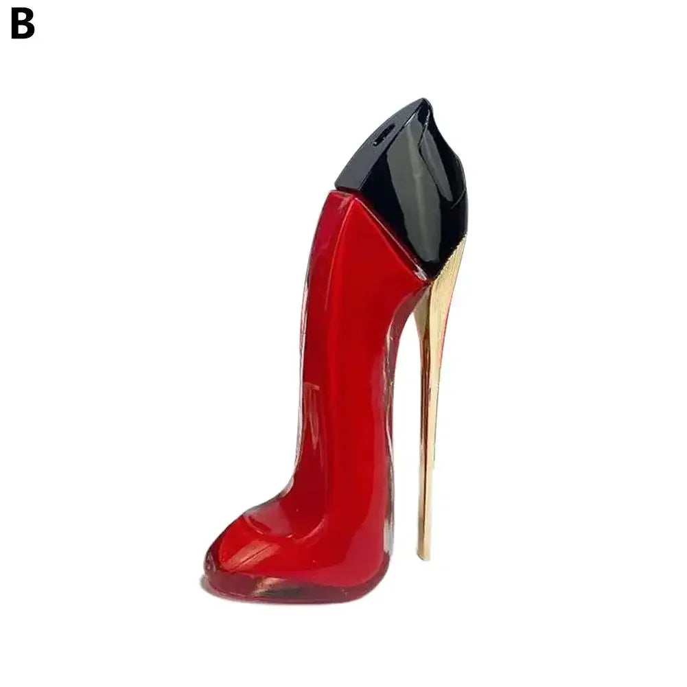 Red high-heeled shoe with black top and gold heel on a white background