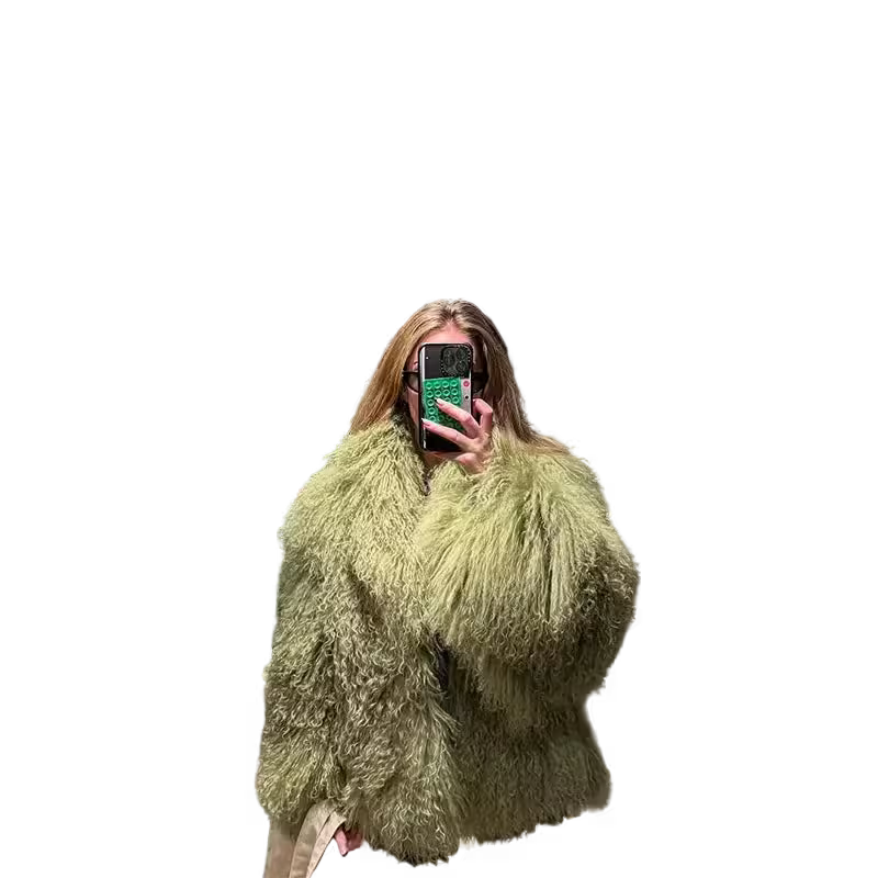 Person wearing a fluffy green coat against a white background