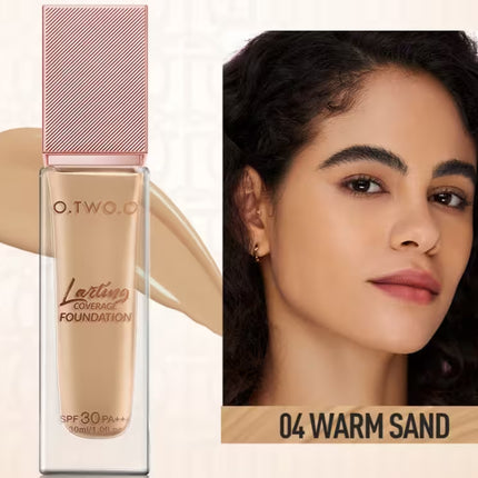 O.TWO.O foundation bottle with a swatch and a woman's face with '04 Warm Sand' foundation.