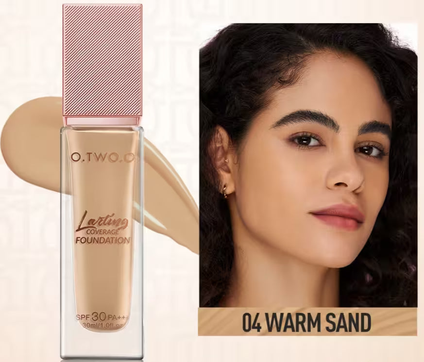 O.TWO.O foundation bottle with a swatch and a woman's face with '04 Warm Sand' foundation.