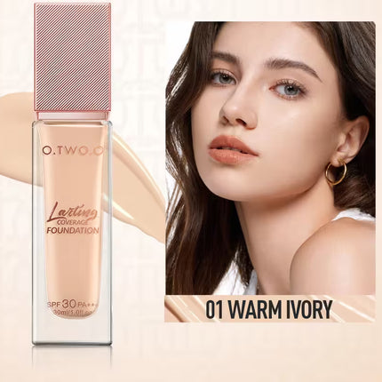 O.TWO.O foundation bottle with a woman's face and '01 Warm Ivory' text on a beige background