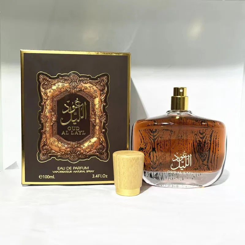 Oud Al Layl perfume bottle and packaging on a white background