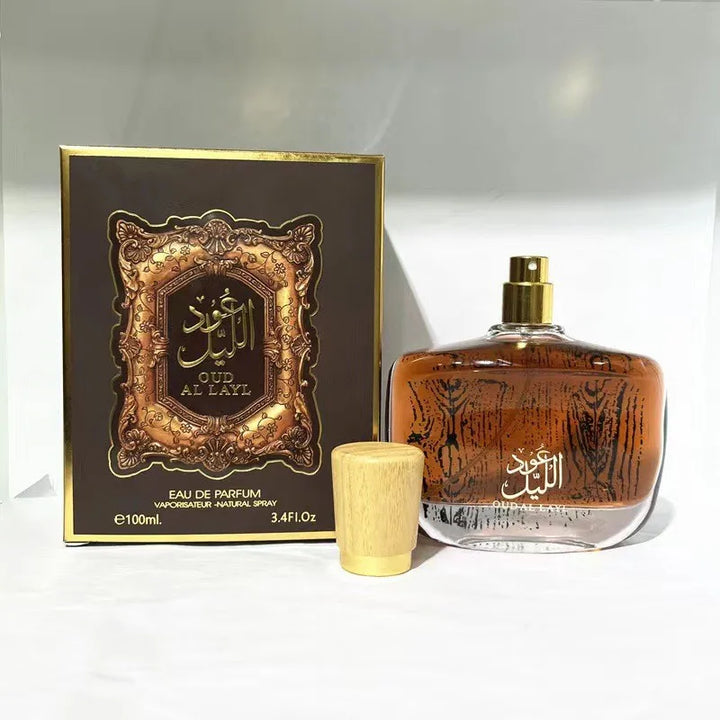 Oud Al Layl perfume bottle and packaging on a white background