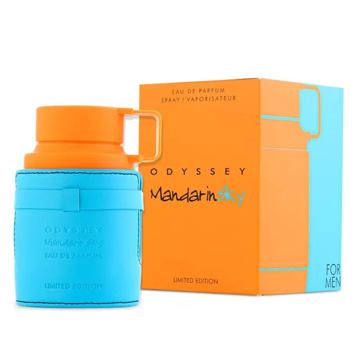 Blue and orange Odyssey Mandarin perfume bottle and packaging on a white background