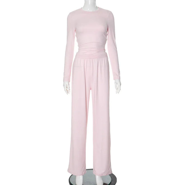 Pink jumpsuit on a mannequin against a white background