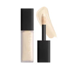 Cosmetic concealer with applicator on a white background