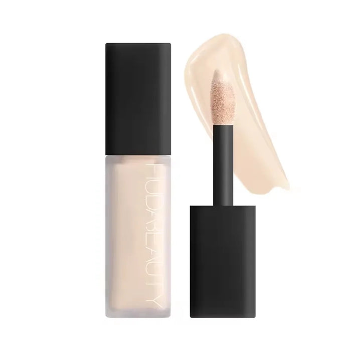 Cosmetic concealer with applicator and visible brand on a white background