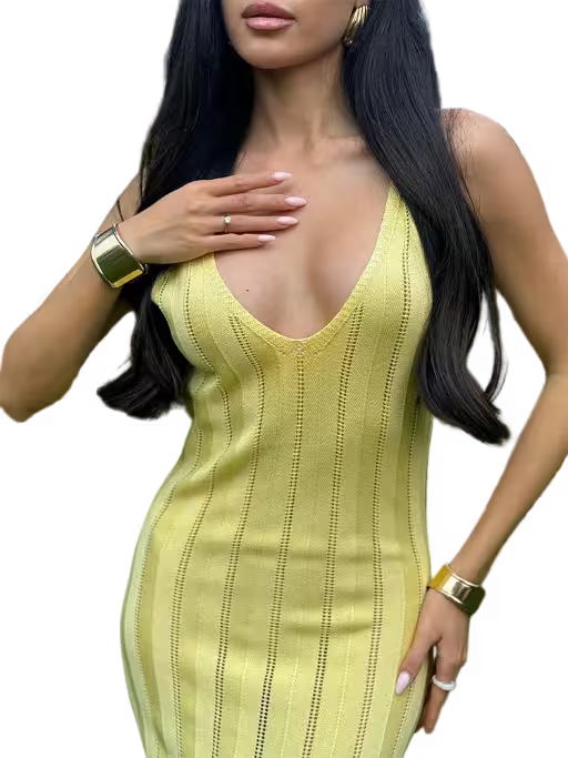 Woman wearing a yellow dress with a plain background