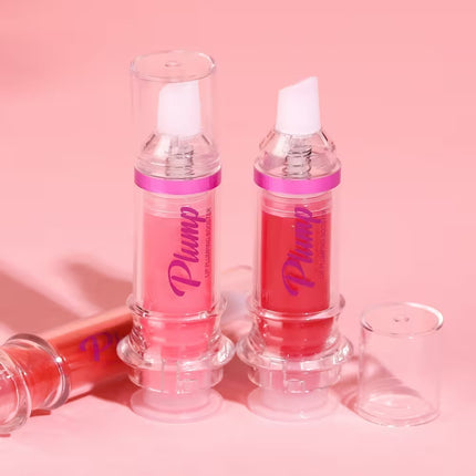Pink lip plumping serum bottles with 'Plump' text on a pink background