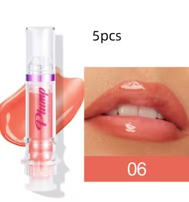 Pink lip gloss with clear casing, labeled 'Pump', on a white background.