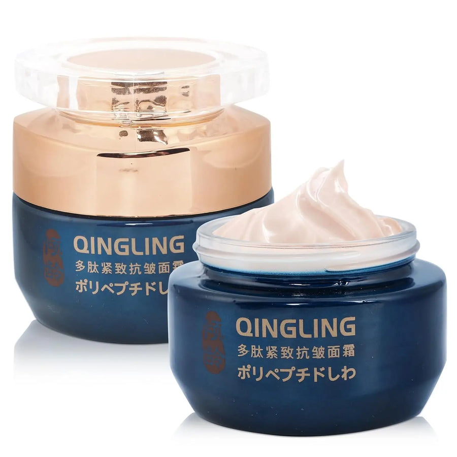 Two blue jars of QINGLING cream on a white background