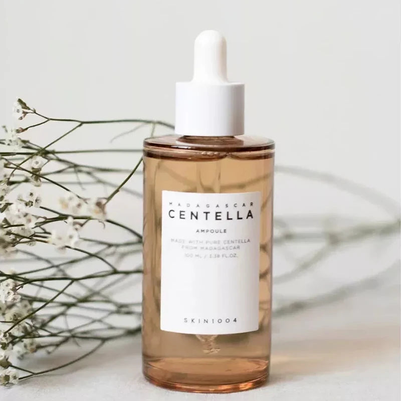 Skincare bottle with dropper labeled 'Mauritius Centella' on a light background