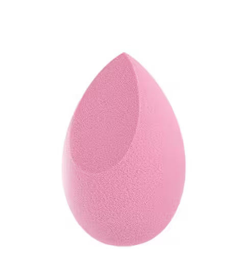 Pink makeup sponge on a white background