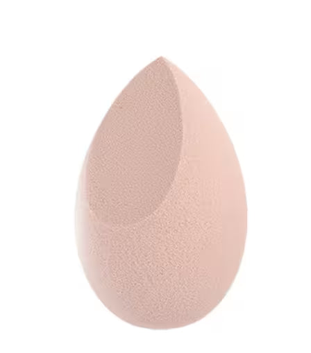 Pink makeup sponge on a white background