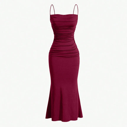 Maroon dress with thin straps on a white background