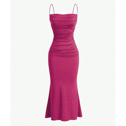 Fuchsia dress with thin straps on a white background
