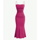 Fuchsia dress with thin straps on a white background