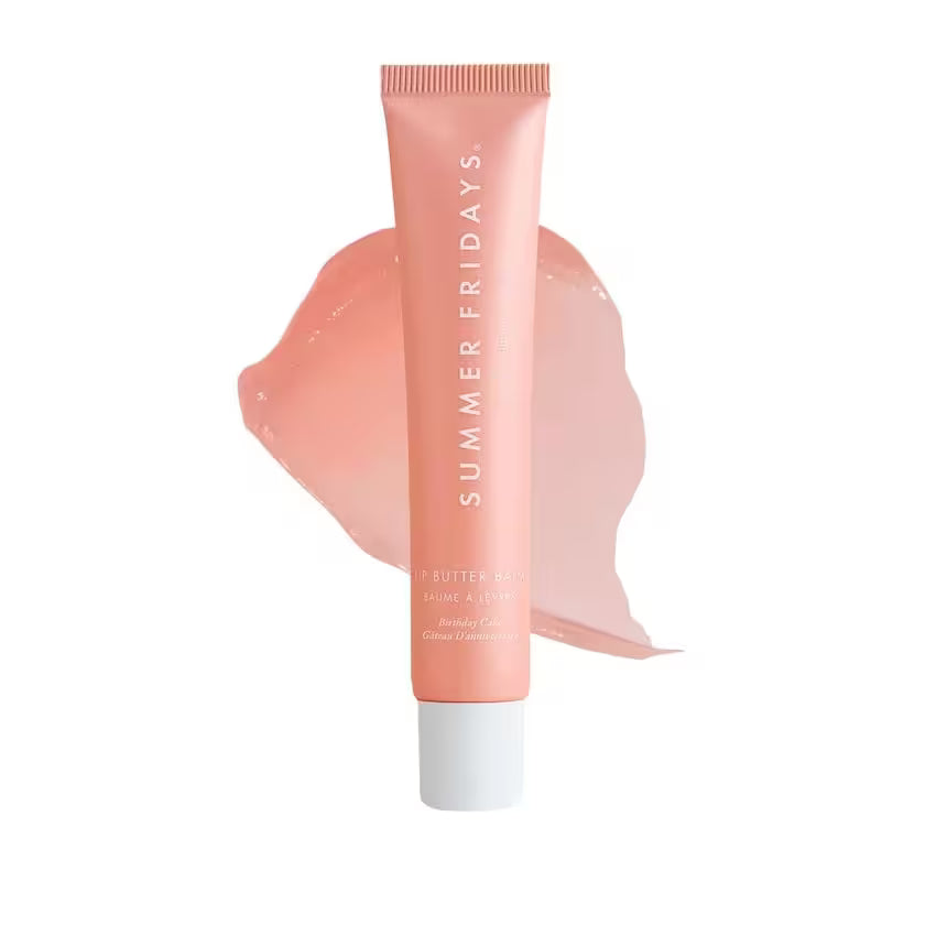 Pink Summer Fridays skincare product with a white cap on a white background