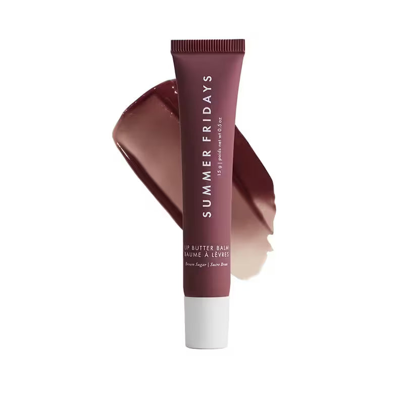 Lip balm tube with a swatch of brown color on a white background