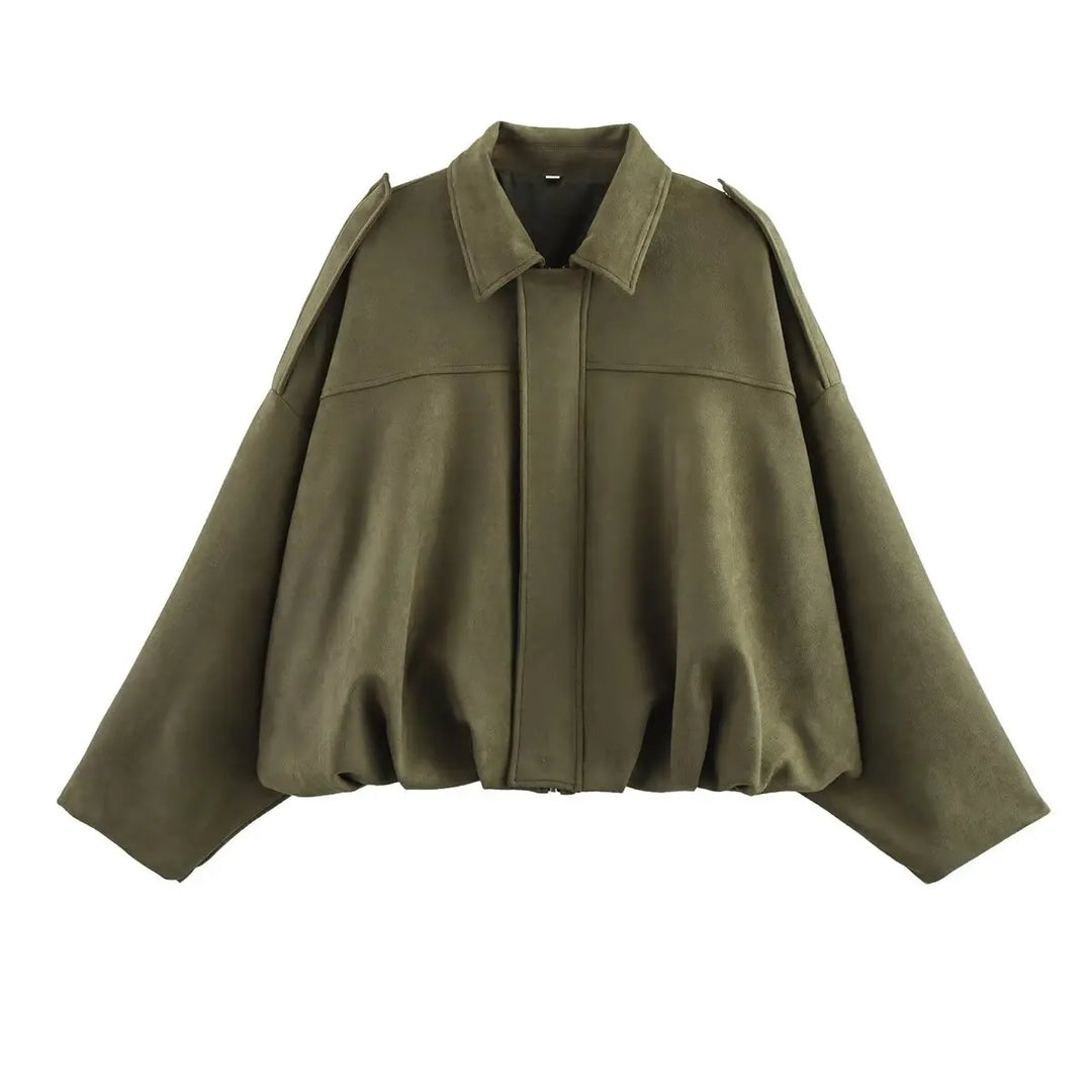 Green cape coat on a white background