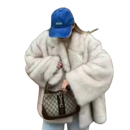 Person wearing a white coat and blue cap with a handbag on a transparent background
